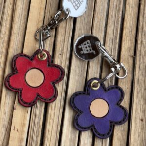 Leather flower fob with trolley token